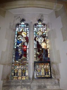 Stained glass in North Mundham. 