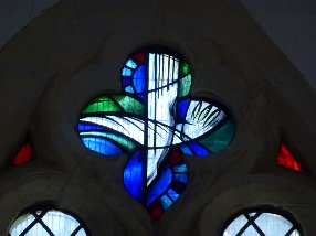 Staine glass window in Earnley.