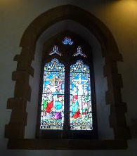 Stained glass window in Ditchling Church. 