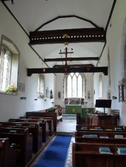 The aisle in the Church of St Nicholas in Poling.